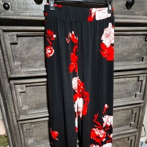Ashley Stewart Black red wide leg palazzo pants.